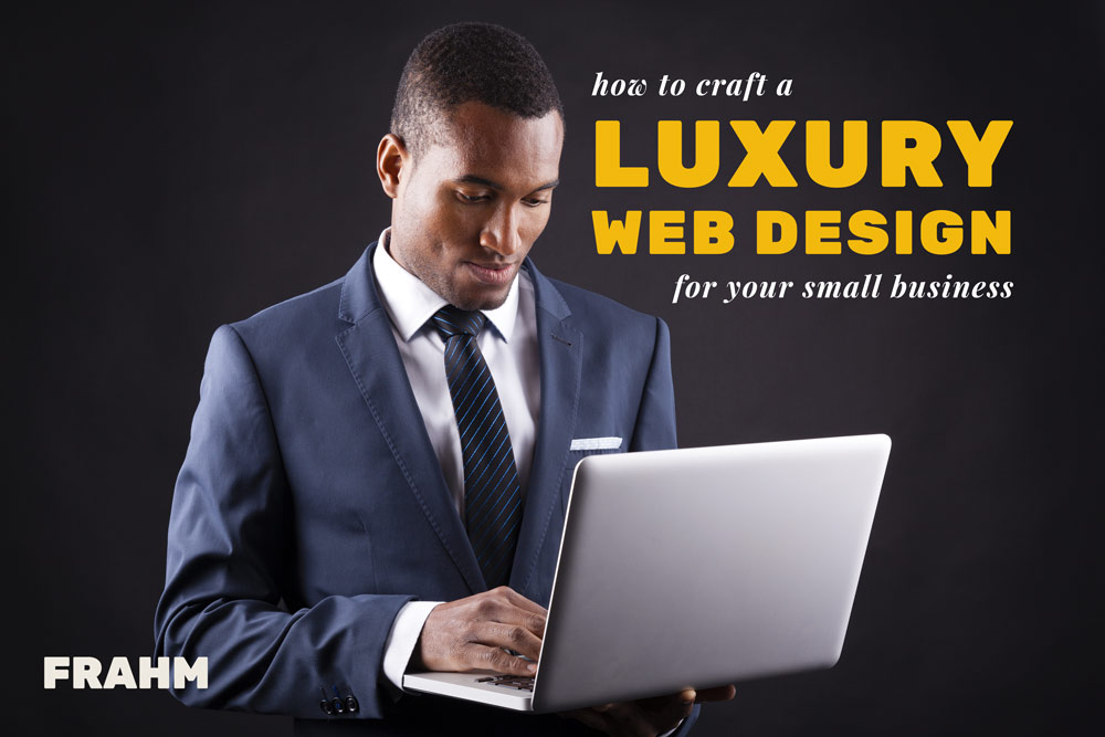 Luxury Web Design featured image – business professional in a suit looking at a laptop