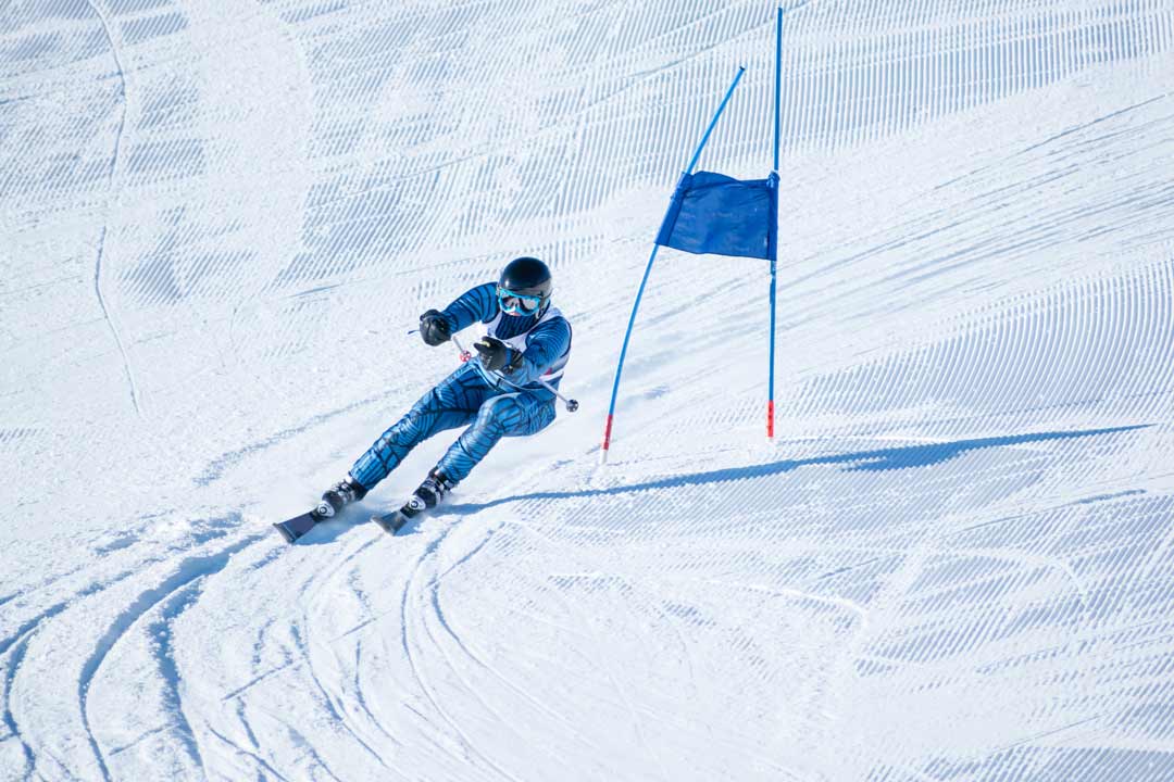 Race Skier rounding a flag at Hyland Hills in Bloomington, MN
